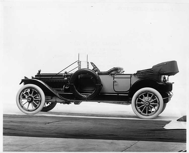 1913 Packard 38 phaeton, five-sixth rear view, left side, top folded