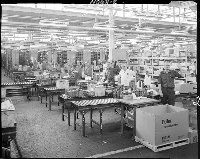 Men on assembly line