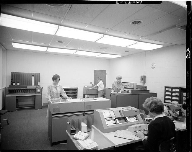 People in computer room