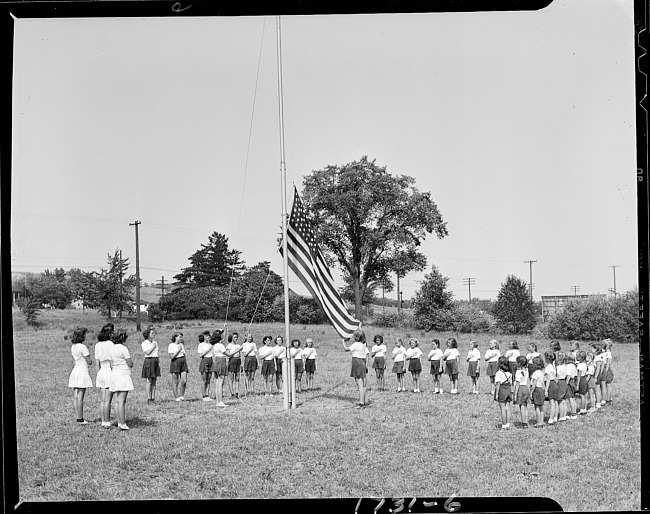 Young girls at flag raising