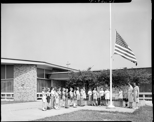 Schoolchildren with U.S. flag