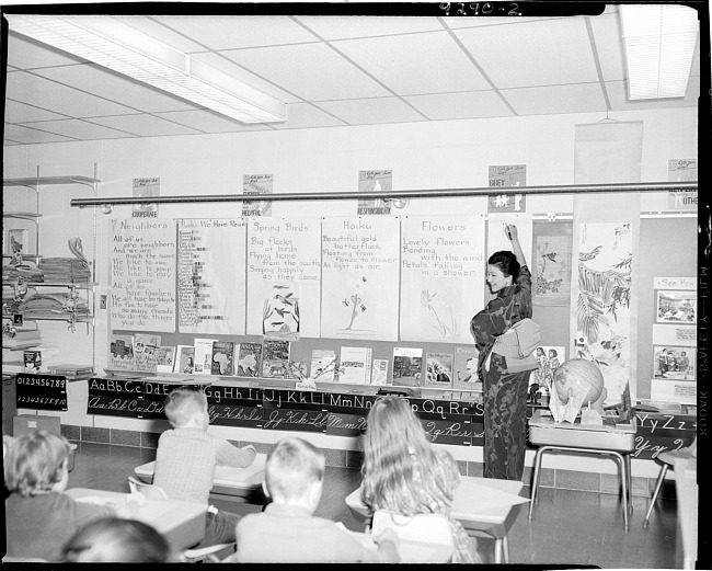 Japanese woman teaching a class