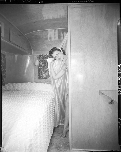 Woman in Kozy Coach bedroom