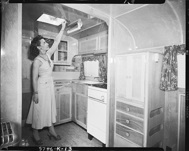 Woman in Kozy Coach kitchen