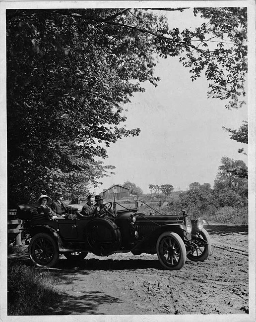 1913 Packard 48 phaeton, turning out of drive, barn in background