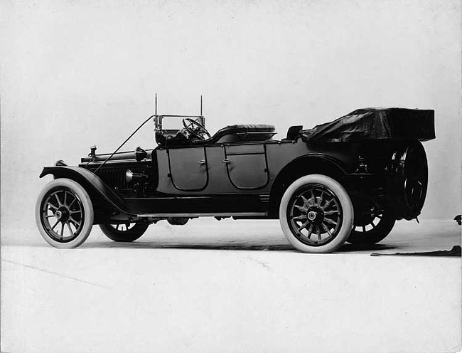 1914 Packard 2-38 two-toned touring car, three-quarter rear view, left side, top folded