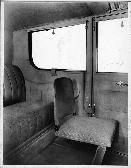 1917 Packard landaulet, view of rear interior from left side door, showing side-folding auxiliary seat