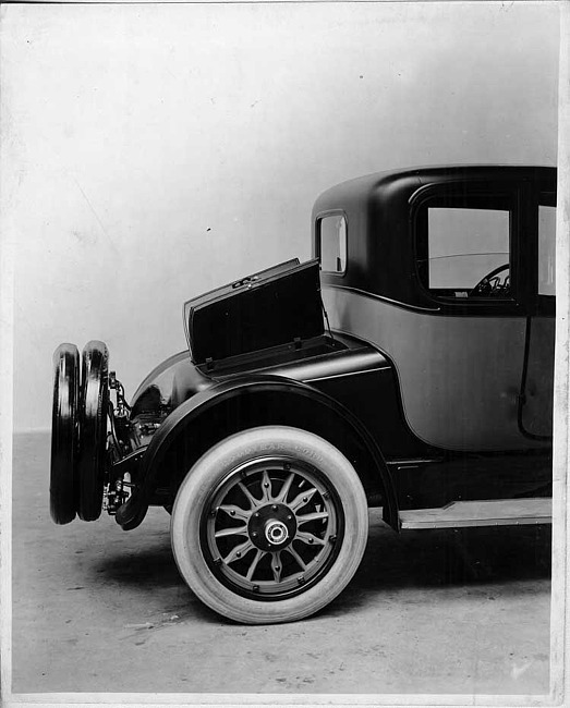 1917 Packard two-toned coupe, side rear view, compartment door opened