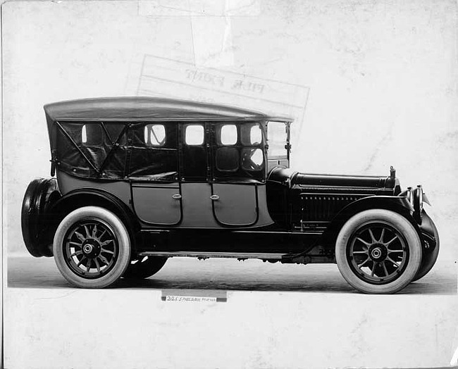 1917 Packard two-toned salon phaeton, top raised, side curtains in place, seven-eights right front view