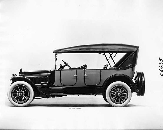 1917 Packard two-toned touring car, left side view, top raised