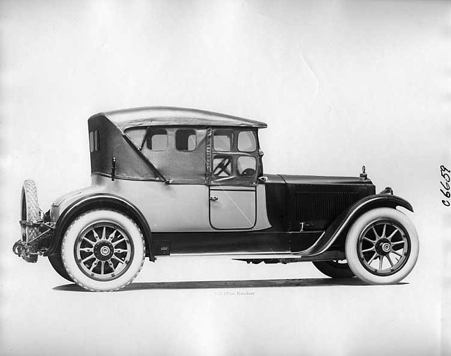 1918 Packard two-toned runabout, nine-tenths right rear view, top raised, side curtains in place