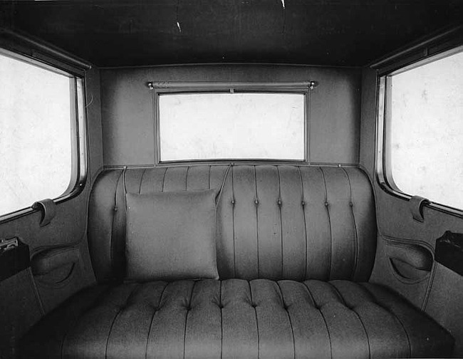 1920-1923 Packard duplex sedan, view of rear interior, close-up view of rear bench seat