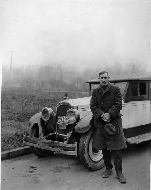 1922-1923 Packard touring car used as Detroit jitney, with driver