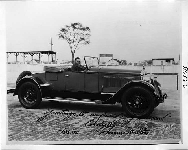 1925 Packard roadster, nine-tenths right front view, race car driver Tommy Milton at wheel