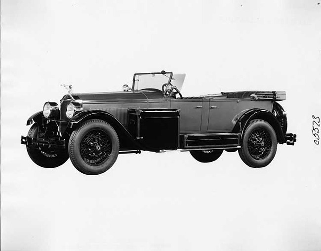 1925 Packard two-toned touring car, storage pieces displayed on running board