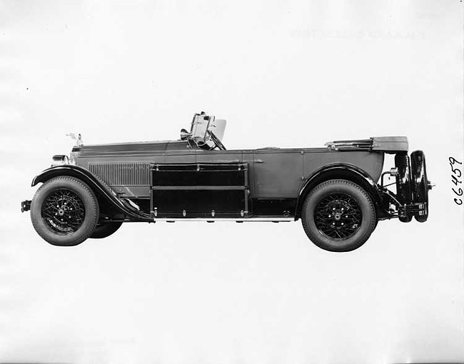 1926 Packard two-toned touring car, left side view, top lowered, trunk carried on running board