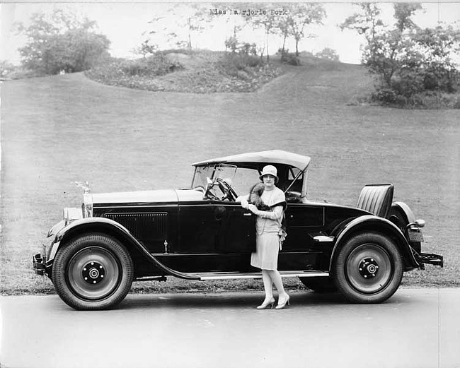 1927 Packard runabout, owner Miss Marjorie Dork standing at driver's door