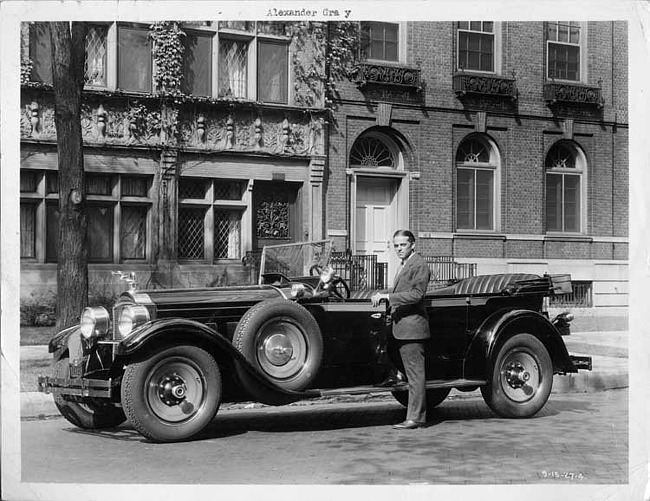 1928 Packard touring car, actor Alexander Gray standing at driver's door