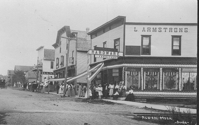 Helena Street decorated, with crowd