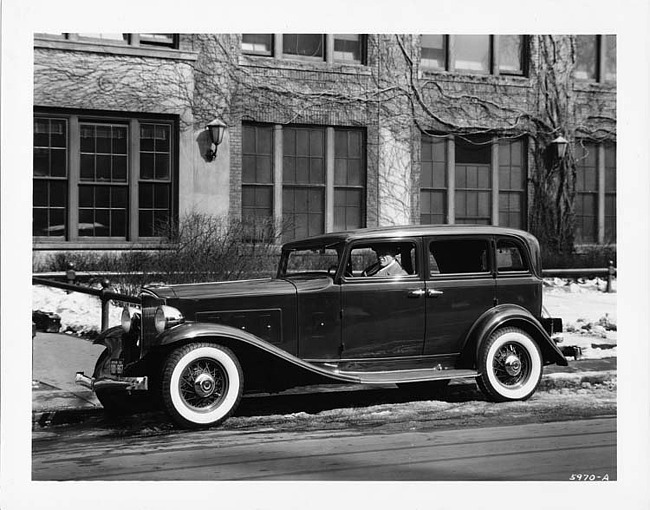 1932 Packard sedan, owner coach Heartly 'Hunk' Anderson behind wheel