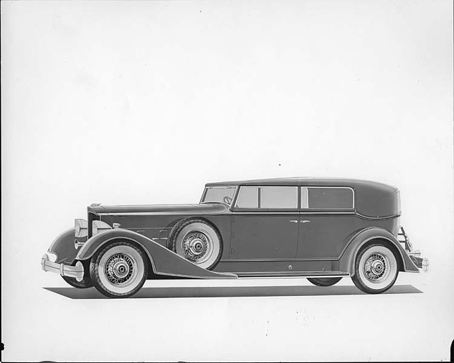 1934 Packard convertible sedan, nine-tenths left side view, top raised