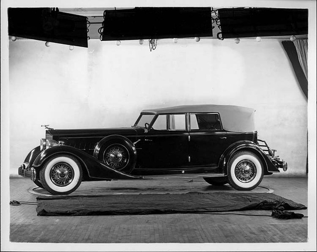 1934 Packard convertible sedan, nine-tenths left side view, top raised