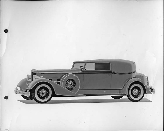 1934 Packard convertible victoria, nine-tenths left side view, top raised