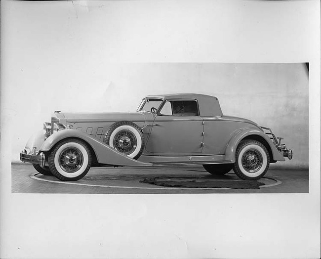 1934 Packard convertible runabout, nine-tenths left side view, top raised