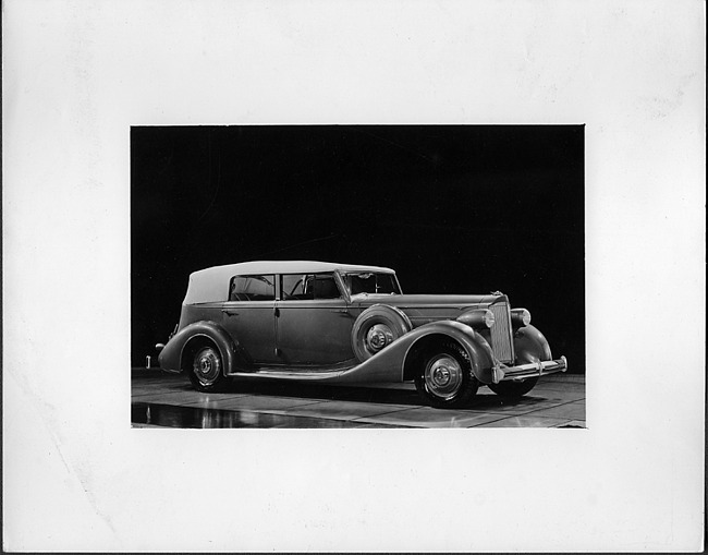 1935 Packard convertible sedan, three-quarter right side view, top raised