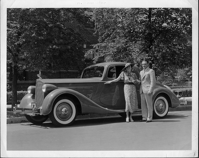 1935 Packard coupe with Mrs. Marcus Oliver and John S. Jackson