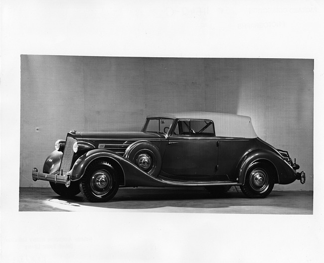 1936 Packard convertible victoria, nine-tenths left side view, top raised