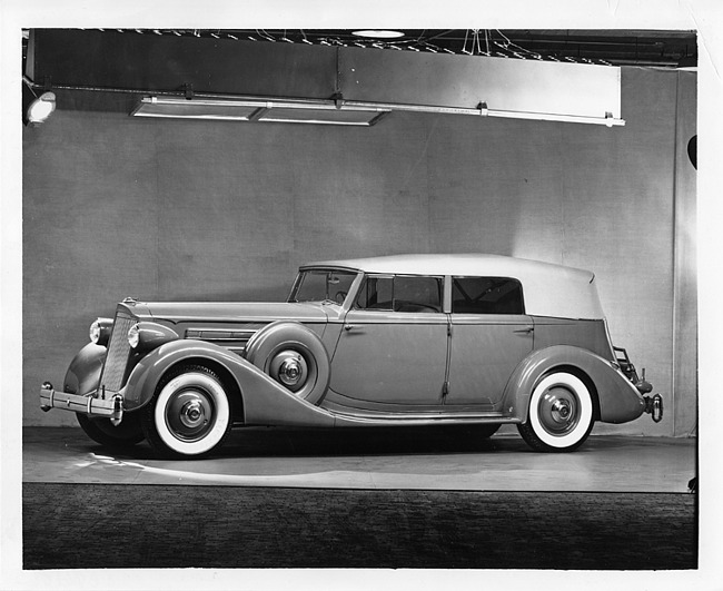 1936 Packard convertible sedan, nine-tenths left side view, top raised