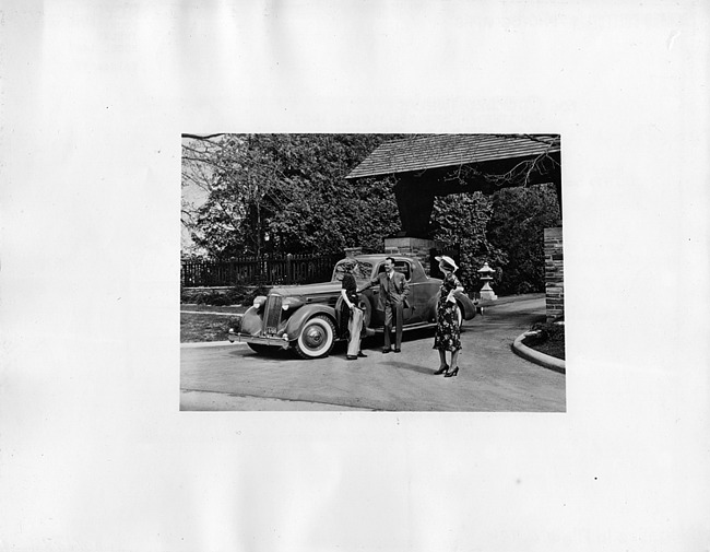 1936 Packard coupe parked at end of drive