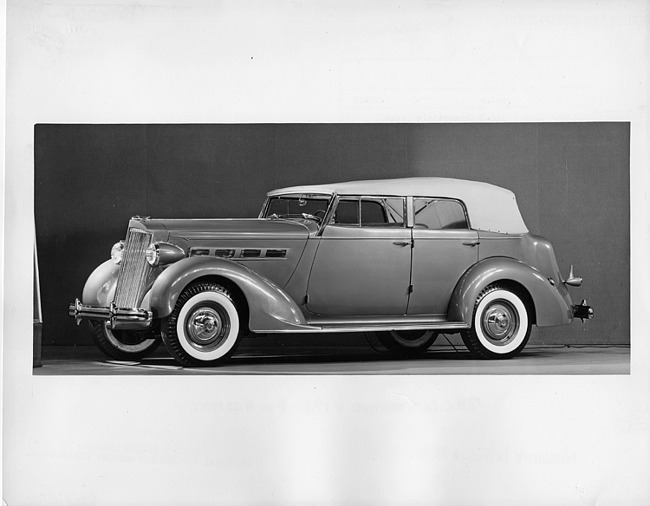 1937 Packard convertible sedan, nine-tenths left side view, top raised