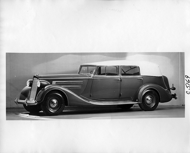 1937 Packard convertible sedan, nine-tenths left side view, top raised