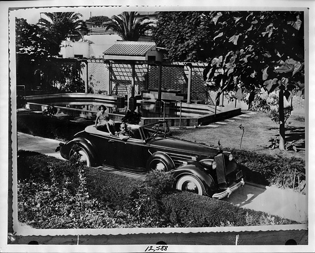 1937 Packard convertible victoria, parked by swimming pool in Lima, Peru