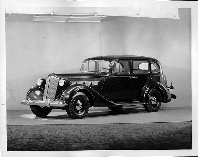 1937 Packard touring sedan, three-quarter front view