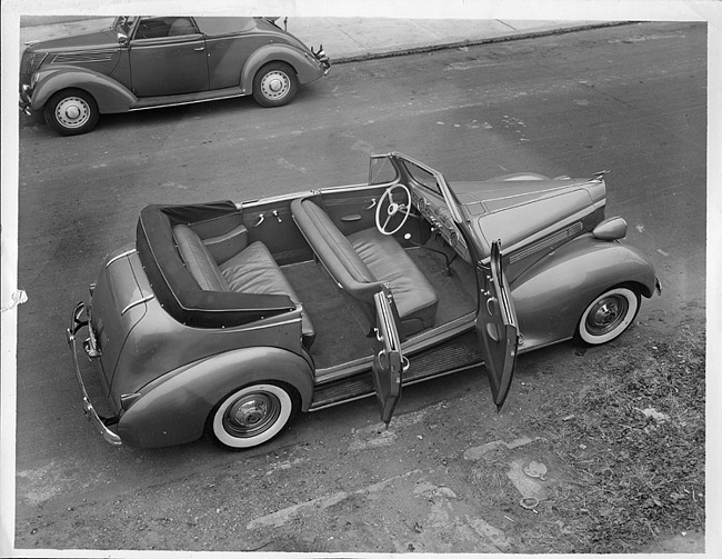 1938 Packard convertible sedan parked on street, view from above