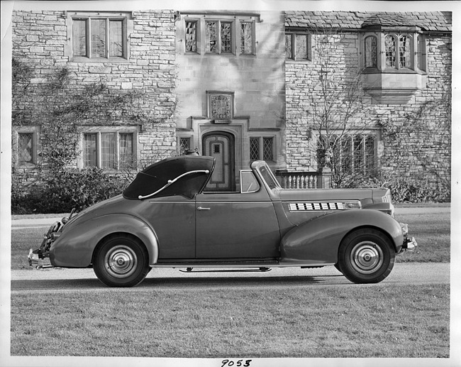 1939 Packard convertible coupe parked in driveway of Alvan Macauley's home