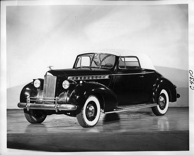 1940 Packard convertible coupe, three-quarter front view, top raised