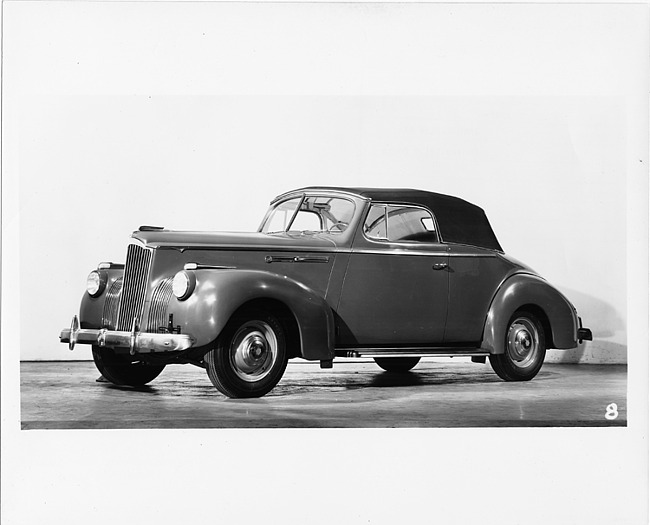 1941 Packard convertible coupe, seven-eights left side view, top raised