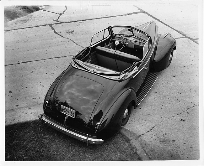 1941 Packard convertible coupe, three-quarter rear elevated view, interior visible