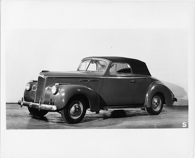 1941 Packard convertible coupe, seven-eights left side view, top raised