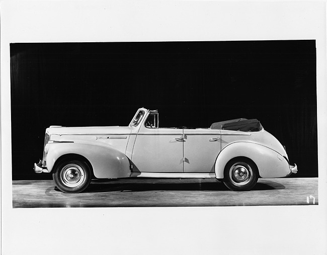 1941 Packard convertible sedan, left side view, top folded