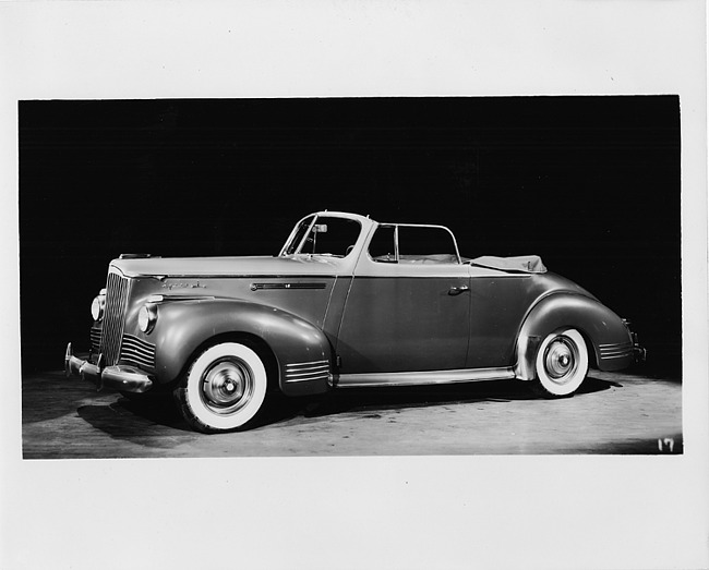 1942 Packard convertible coupe, nine-tenths left front view, top folded