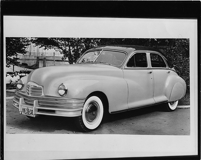 1946 Packard Clipper sedan, three-quarter left front view, parked on drive