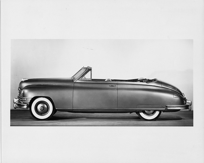 1948 Packard convertible victoria, left side view, top folded