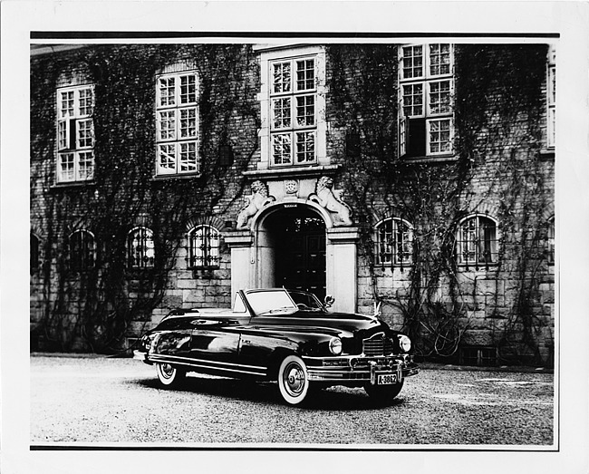 1948 Packard convertible, parked in front of large house in Oslo, Norway