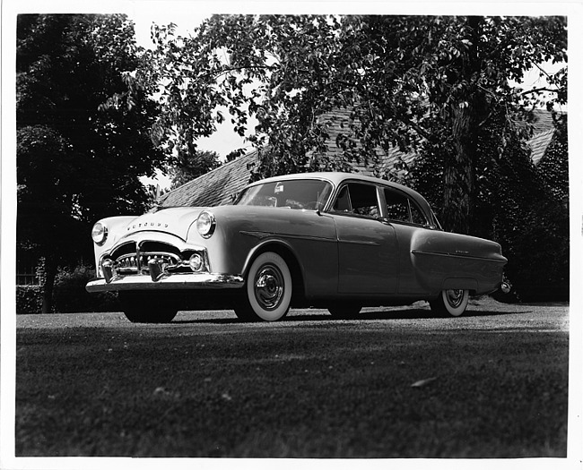 1951 Packard 300, three-quarter front left view, parked on grass