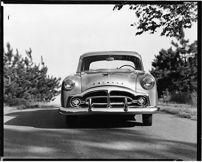 1951 Packard 200 sedan, front view, parked on hill